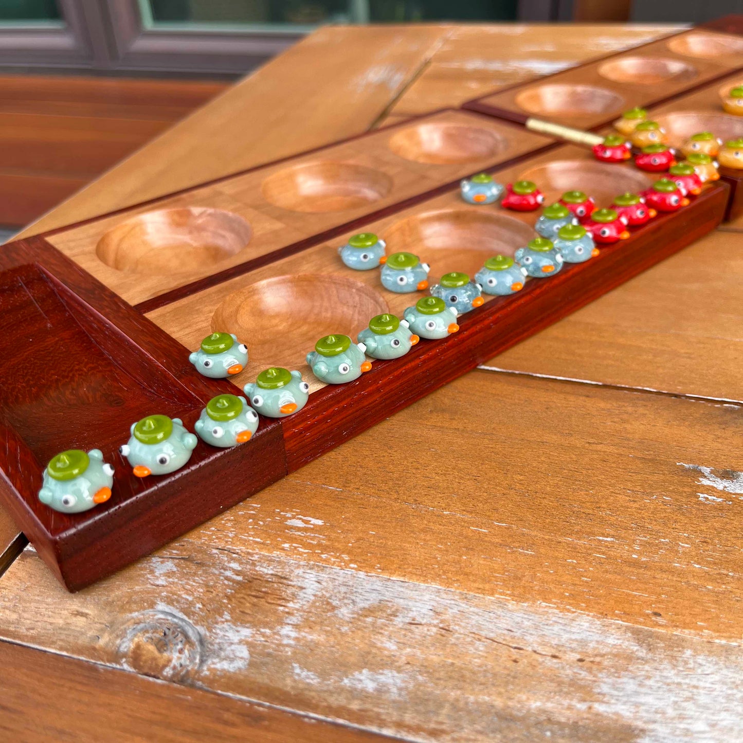 Mancala ducks: set of 48 glass ducks